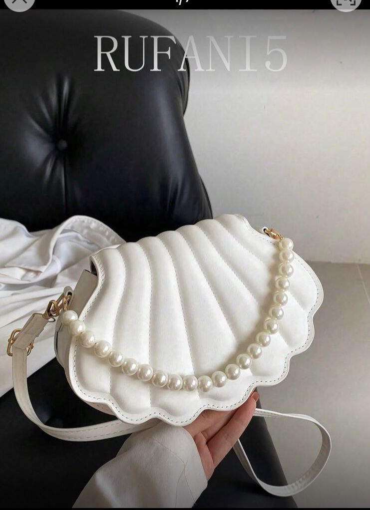 Bolso bandolero con diseño de concha