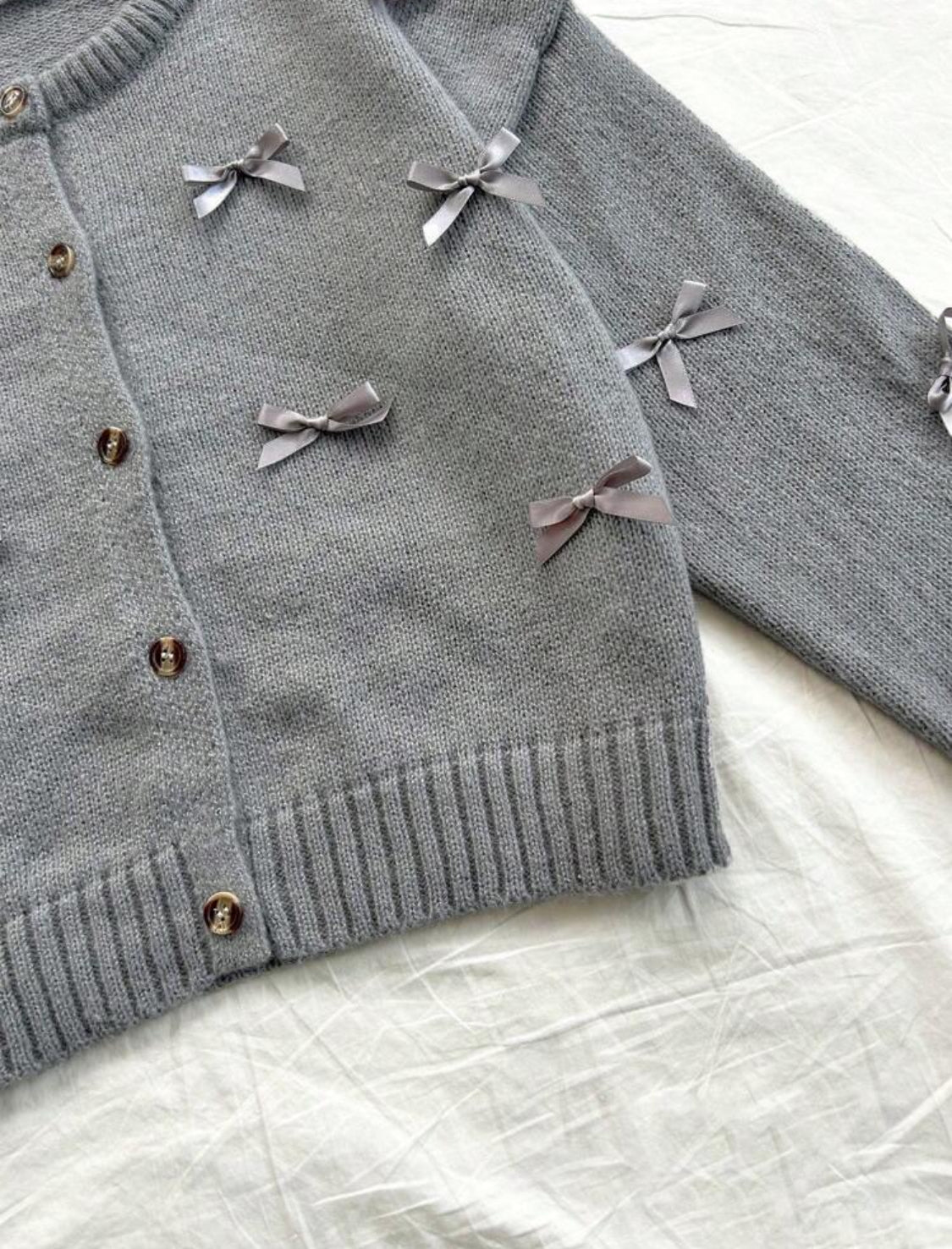 Suéter con moñitos Talla Mediana