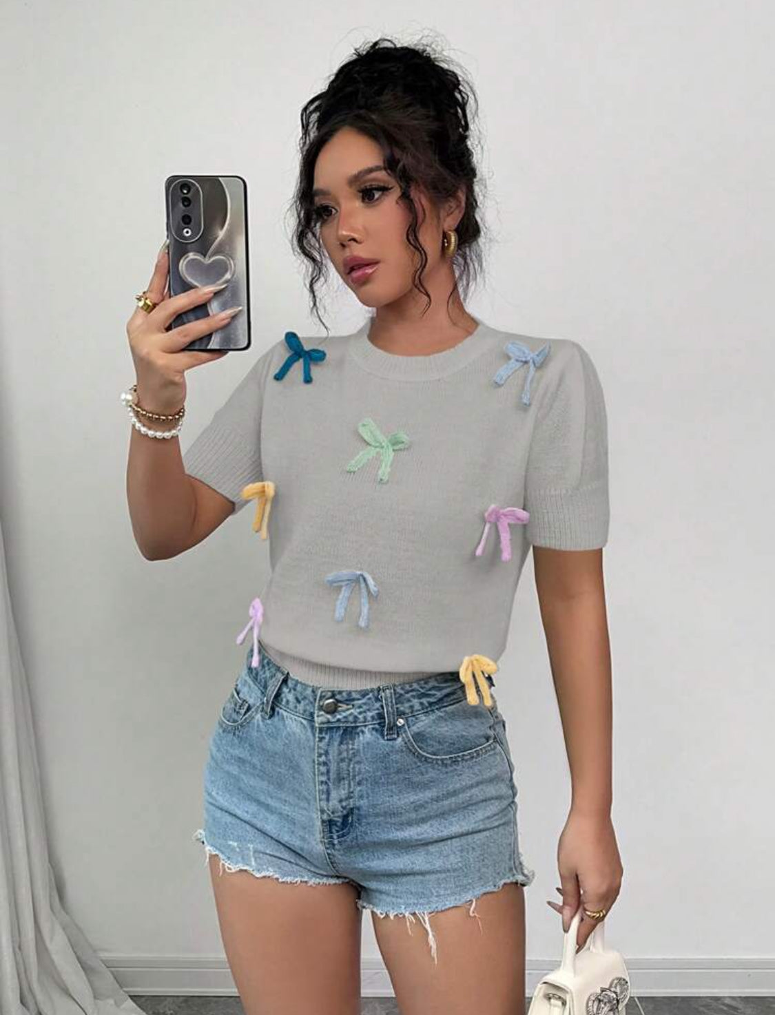 Blusa de punto con moños arcoíris Talla Mediana