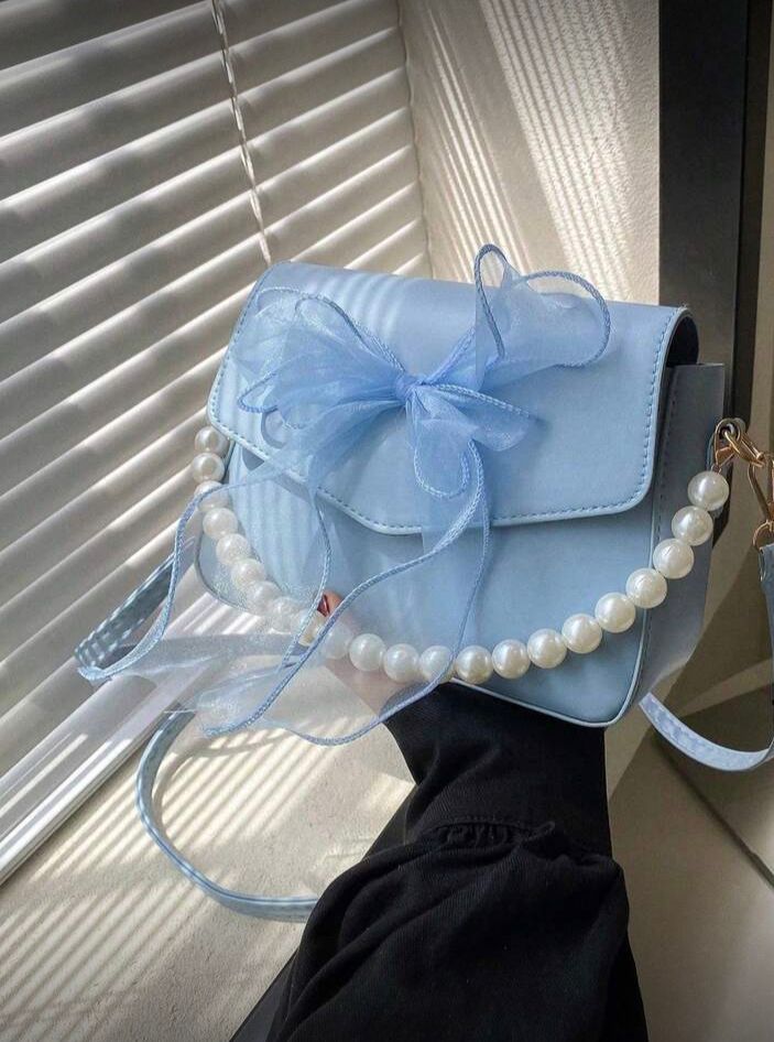 Crossbody con moño de liston y perlas Azul