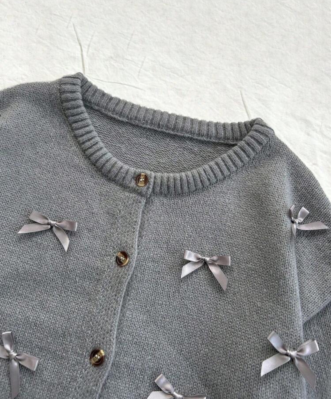 Suéter con moñitos Talla Mediana