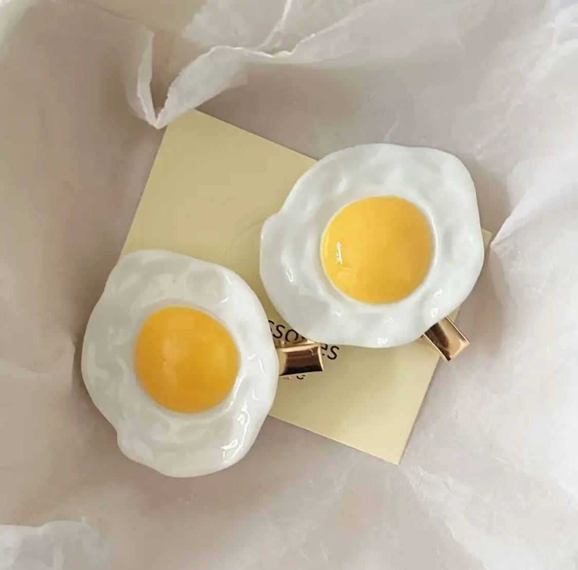 Clips en forma de huevos estrellados (2 pzs)