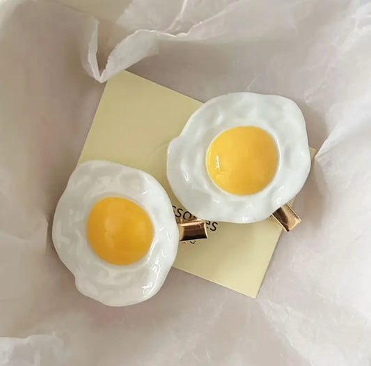 Clips en forma de huevos estrellados (2 pzs)