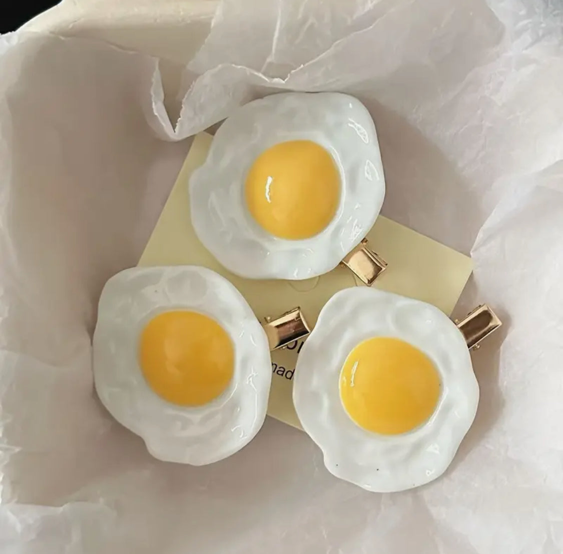 Clips en forma de huevos estrellados (2 pzs)