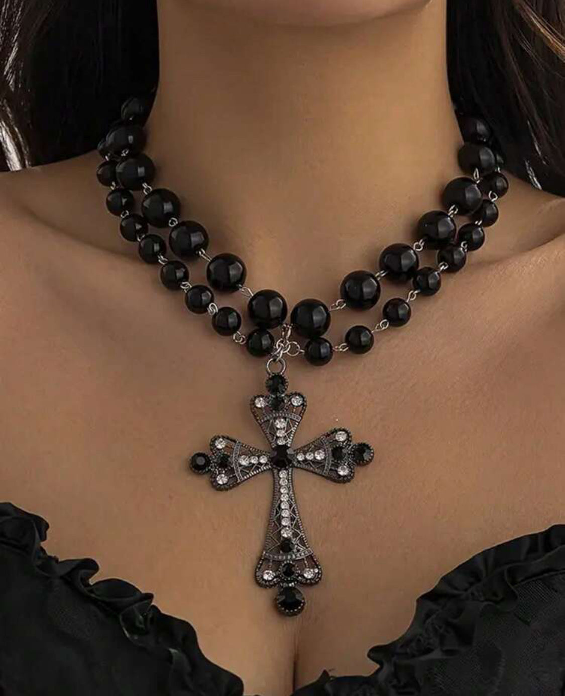 Collar en forma de cruz