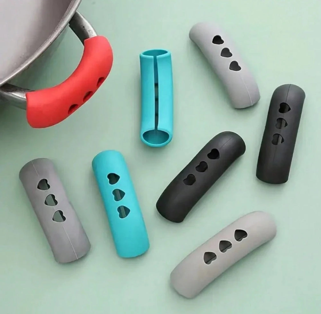 Protector de silicona para agarraderas de las ollas color negro (2 pzs)