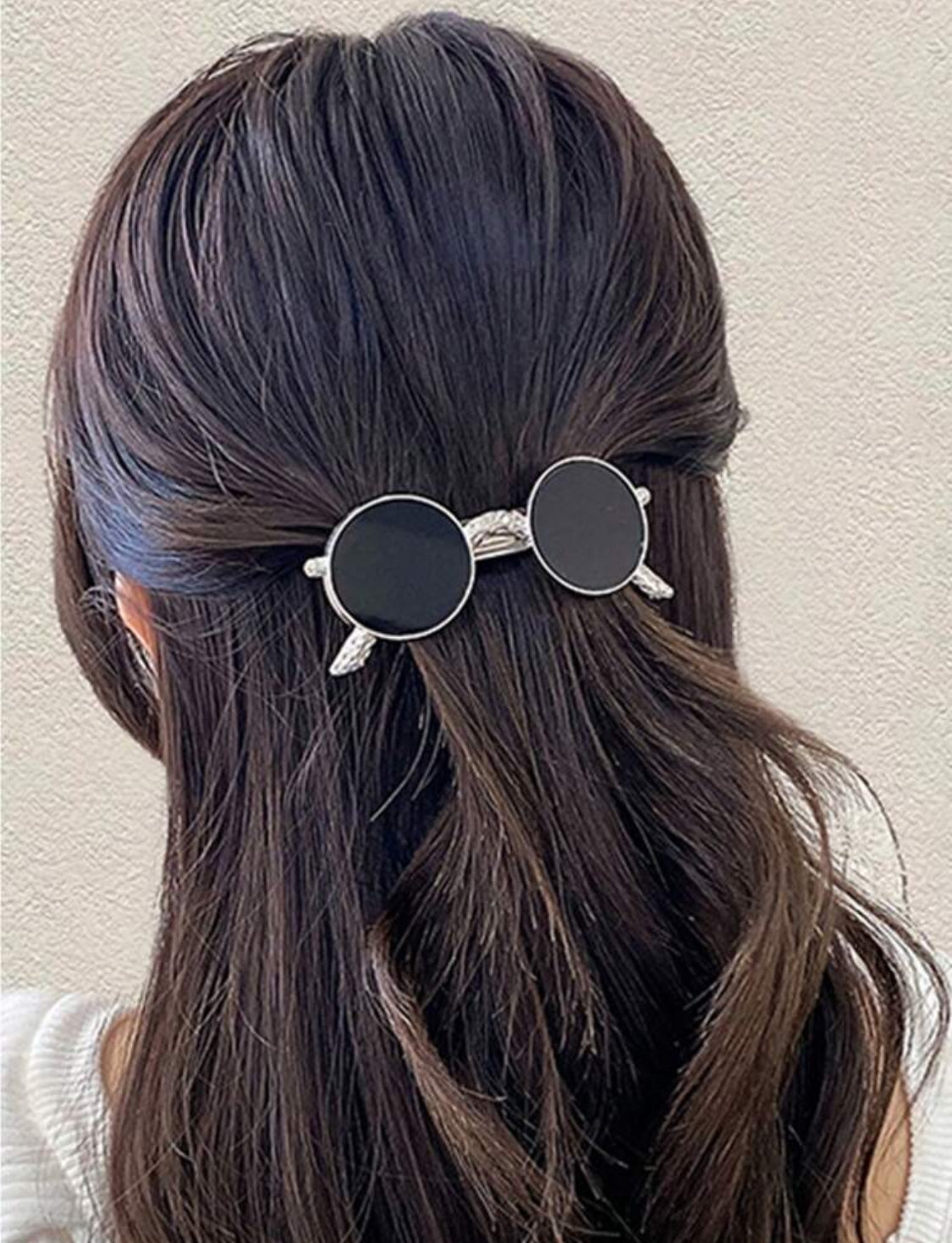 Clip para pelo en forma de gafas