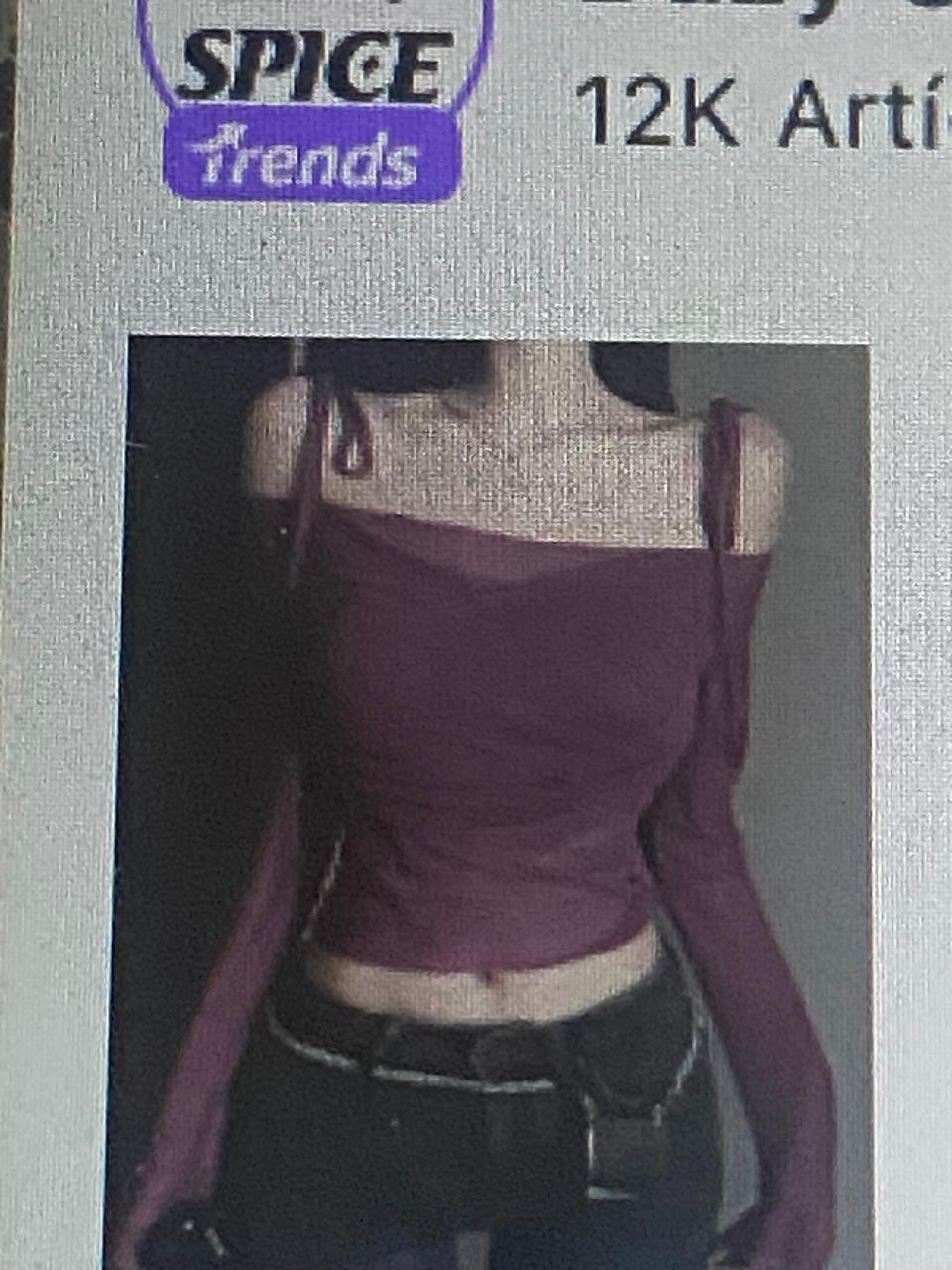 Blusa morada de manga larga con tirantes