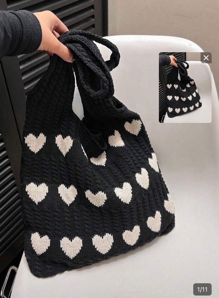Bolso de red con patrón de corazones blancos, negro