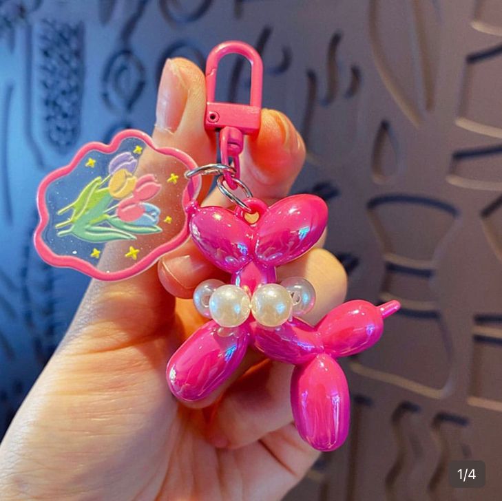 Llavero con diseño de perrito y burbujas, rosa fiusha.