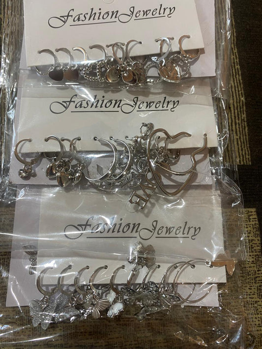 Aretes con diseño de corazones, plata, $15 cada par